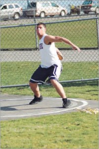 Paul DiPlatzi winds up for a discus throw during a recent Northeastern Conference outdoor track meet. Paul DiPlatzi winds up for a discus throw during a recent Northeastern Conference outdoor track meet.