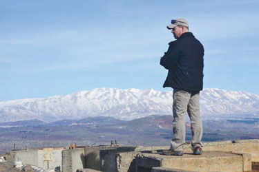 Revere Police Chief Joe Cafarelli surveys the scene at the Israeli- Lebanon border during a counterterrorism trip he took with the Anti-Defamation League of Boston earlier this month. He was one of a dozen law enforcement personnel from the Greater Boston area invited by the ADL to observe and learn from the Israeli National Police Force.